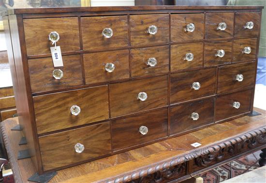 A chemists chest of drawers, W. 126cm